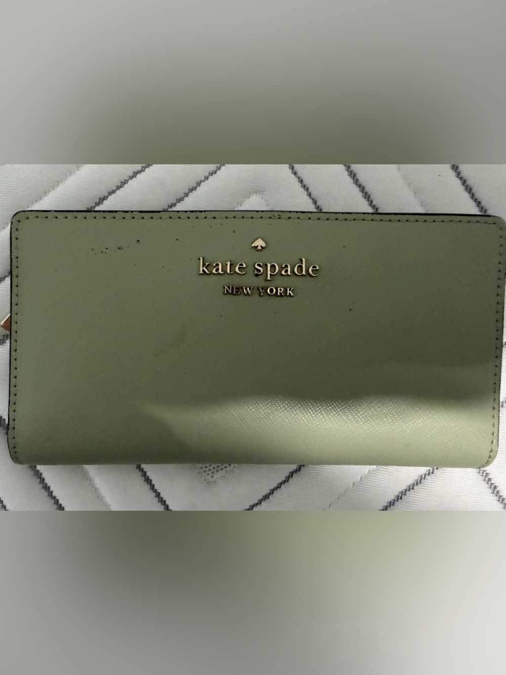 kate spade sage green leather continental wallet with gold logo
